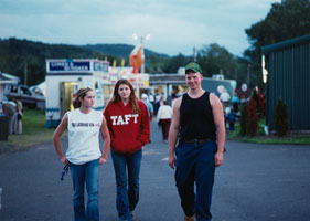 three teenagers walking