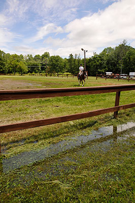 water pooling outside show ring